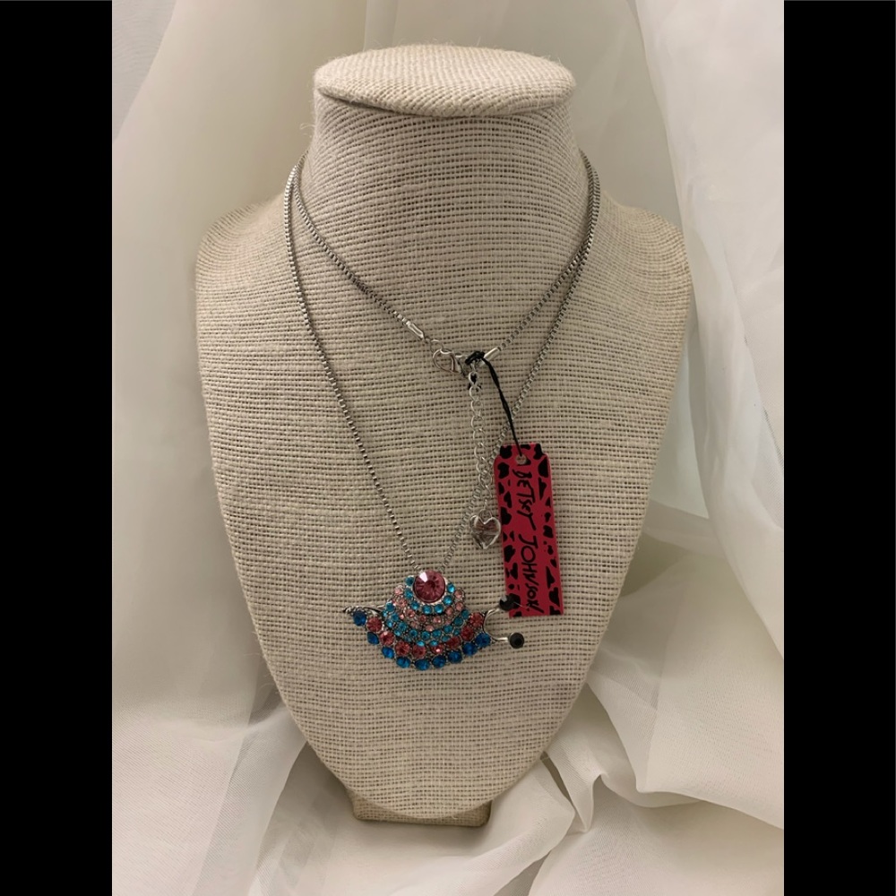Betsey Johnson necklace with pink and blue snail.